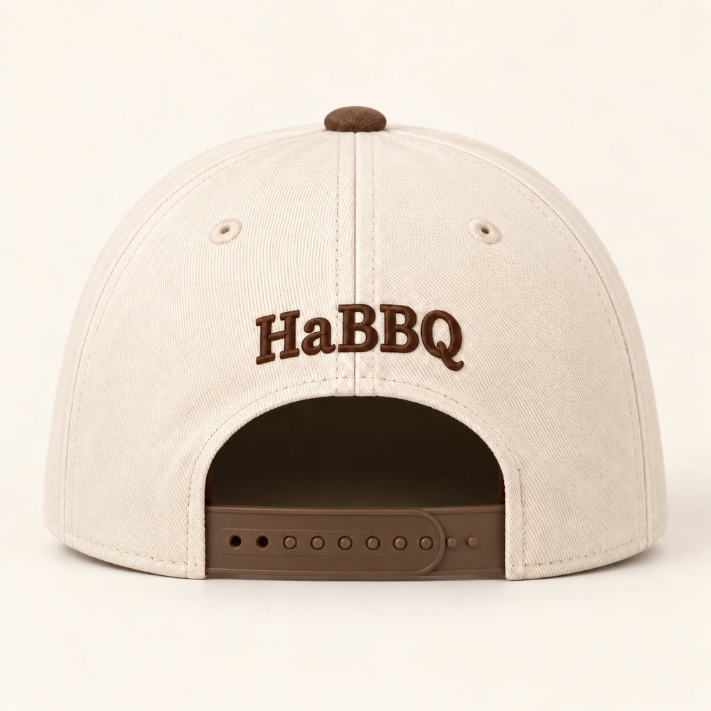 Natural / Walnut Two Tone Cap in a natural crown, walnut brim and walnut embroidery, back view with the small HaBBQ mark above the plastic snapback